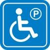 Pictogramme: Une personne se déplaçant en fauteuil roulant avec le sigle P du stationnement.